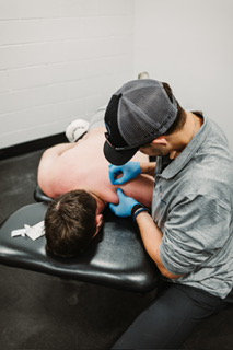 Dr. Kostello performing dry needling